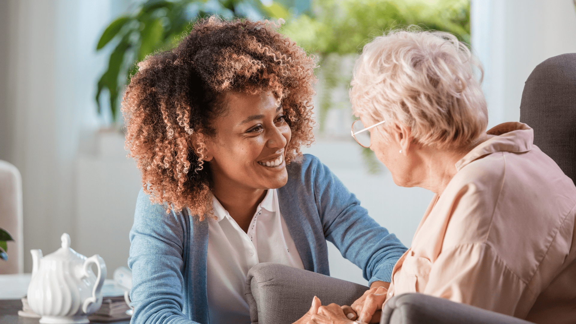 Nurse talking to elderly woman